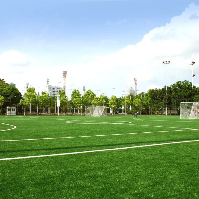 Artificial grass playground and rubber playground surface